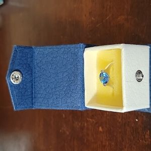 New Blue Topaz Ring in Silver Setting, original box.